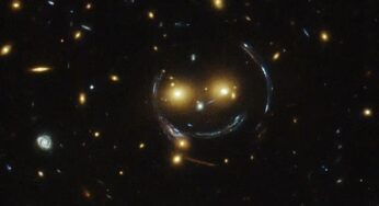 Hubble capta impressionante rosto feliz cósmico em fenômeno de lente gravitacional